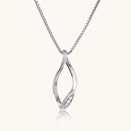 Unveil the enchantment of our 18 kt Tilting Diamond Pendant, priced under Rs. 30,000. A seamless blend of elegance and affordability, this exquisite piece is tailored for everyday wear, elevating your 9 to 5 ensemble with timeless sophistication. Whether as a personal indulgence or a thoughtful gift for her, its allure epitomizes grace and style.