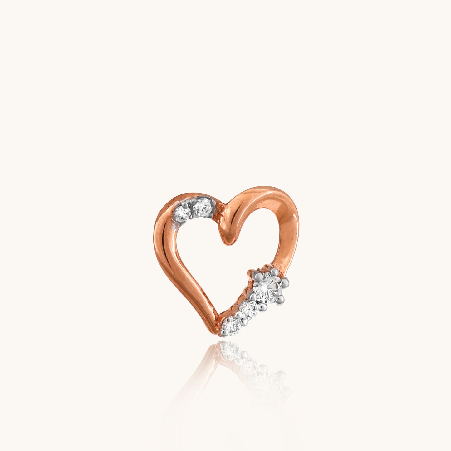 Infuse your style with love through our 18 kt Tiny Heart Pendant from the Spring Edit, priced below Rs. 10,000. Designed to seamlessly transition from day to night, this exquisite jewelry piece adds a touch of charm to any ensemble, making it a perfect addition to her collection or a thoughtful gifting idea.