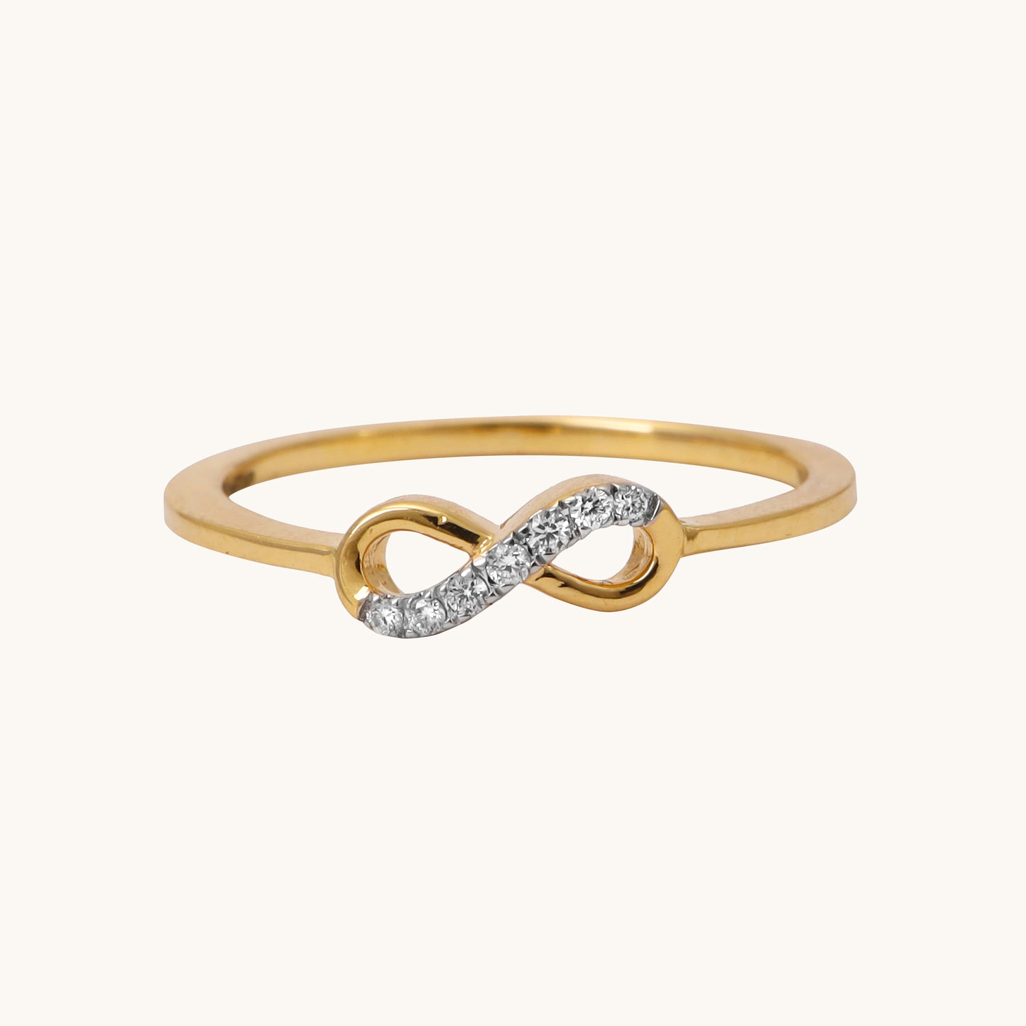 Infinity Simple Ring - 18kt gold and diamond jewellery online. Shop trendy women's jewellery under Rs 20,000. Latest 2024 designs at best prices in India. 18kt gold jewellery in affordable price. Perfect gifts for women seeking minimal styles. Gold and diamond jewellery online, Trendy jewellery, Latest collection, Best prices in India.