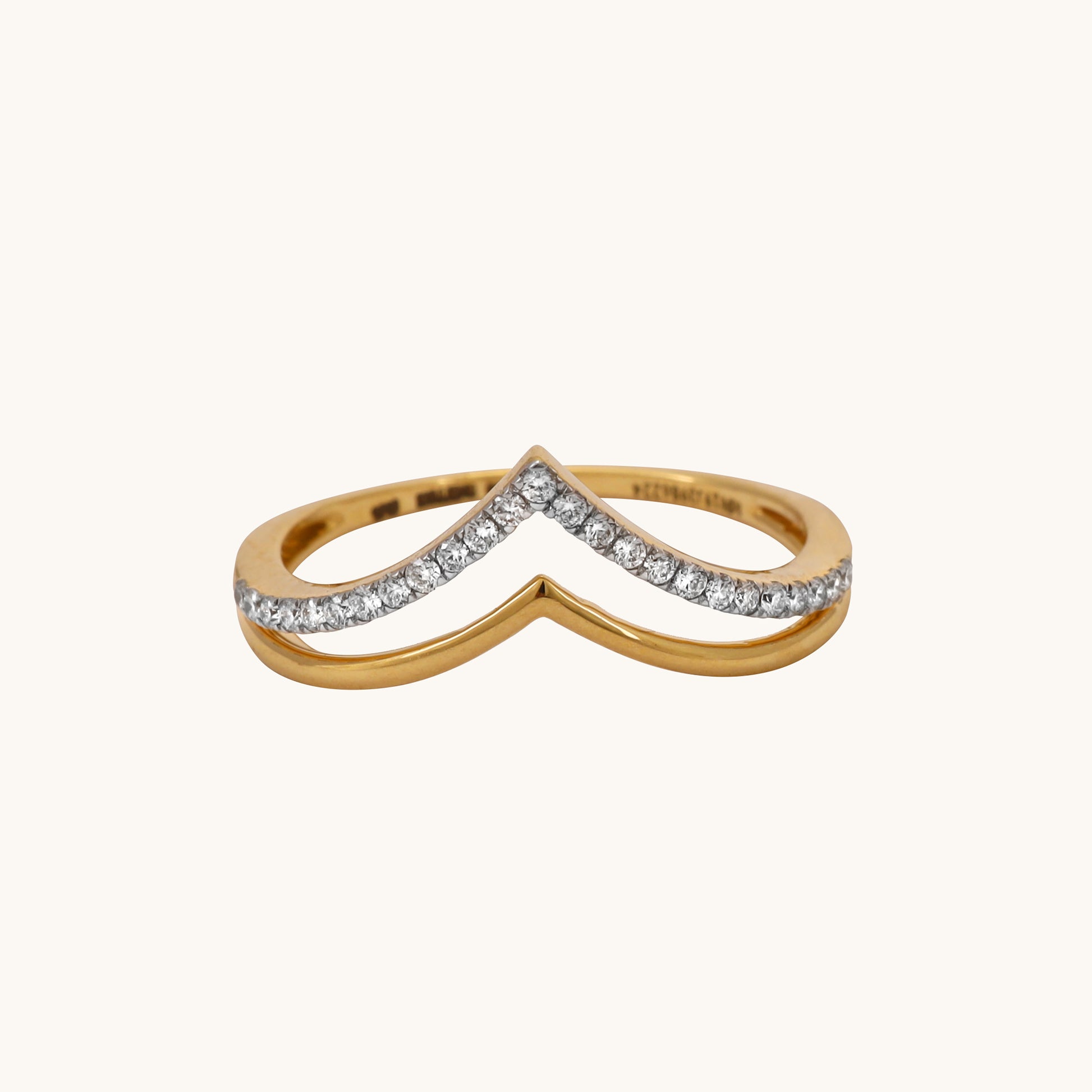 Indulge in elegance with our Swing Diamond 18kt Gold Ring, a captivating accessory that infuses modern sophistication into your everyday style. Whether you're in search of a thoughtful gift for her or a versatile ring to complement your casual and work-wear ensembles, this stunning design is sure to leave a lasting impression, all priced under 30,000.