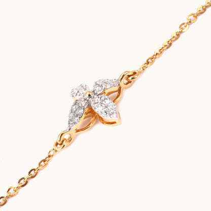 Elevate your everyday style with the Flower Diamond Bracelet in 18kt Gold. Featuring a delicate floral design, this versatile accessory complements both casual and workwear outfits. A thoughtful gift idea for her, priced under Rs. 30,000, this elegant bracelet adds a touch of refined sophistication to any look.