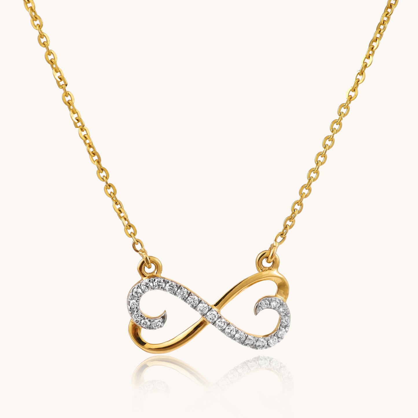 Elevate your style with the enchanting 18 kt Gold Dual Heart Necklace. This dainty pendant necklace is a heartfelt gift idea for her, perfect for showcasing your love and affection. Part of our Under 50,000 collection, this versatile piece effortlessly transitions from casual to workwear, offering an elegant everyday look that complements any outfit with grace. 