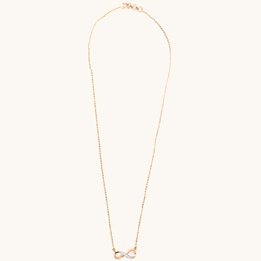 Embrace everlasting elegance with our 18 kt Infinity Diamond Necklace, perfect for everyday wear and effortlessly adding a touch of luxury to any ensemble, whether casual or workwear. It's an ideal gifting idea for her, offering versatility and timeless appeal.