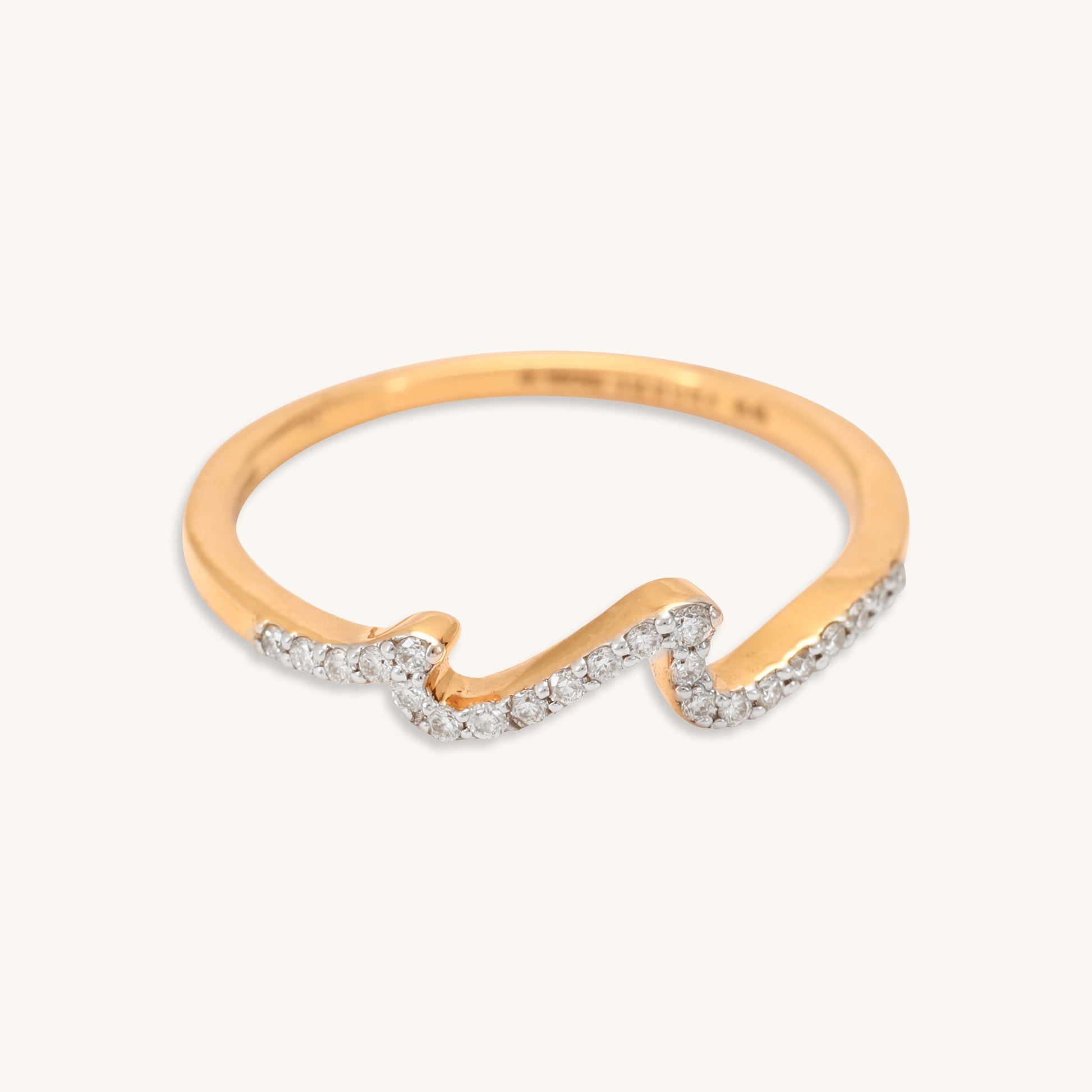 Elegant Wave Diamond Ring made with 18 kt Gold. A stunning everyday wear jewellery piece and perfect gift for her, Combining brilliance and graceful design for daily sparkle under Rs. 30,000.