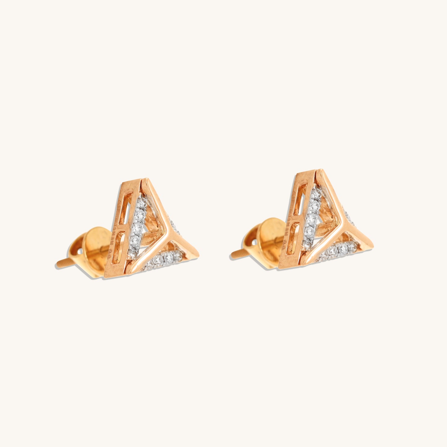 Adorn yourself with our Triangle Diamond Earrings made with 18kt gold for women. Gift these timeless jewellery to celebrate special occasions or simply to show your appreciation. Luxurious gifting option under Rs. 30,000.