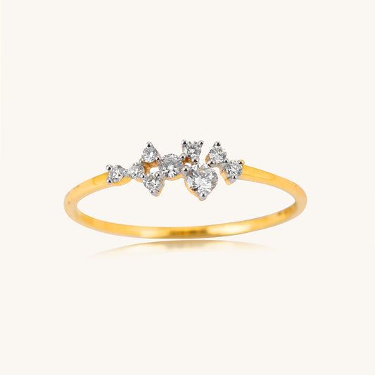 Elevate your look with our stunning 18kt gold ring, adorned with a delicate cluster of sparkling diamonds. Whether for everyday wear or special occasions, this ornate design exudes timeless elegance, adding a touch of sophistication to any outfit. Priced under Rs. 30,000, it makes a thoughtful gifting idea for her. Effortlessly transition from work to weekend with this versatile piece.