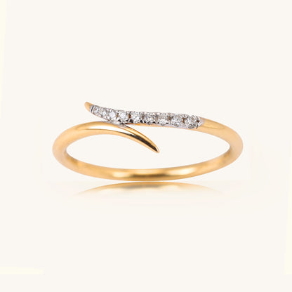 Dive into elegance with our 18 kt Teensy Wave Ring, a stunning addition from our spring edit collection, all priced affordably under Rs. 30,000. This exquisite jewellery piece effortlessly transitions from day to night, ensuring versatility for any ensemble. Ideal for gifting, it adds a touch of sophistication to her collection.