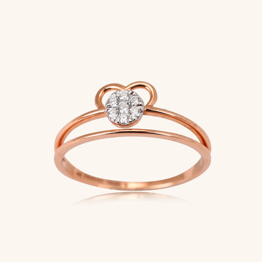 Elevate your everyday style with the Radiant Heart Ring, a stunning 18kt gold piece featuring a captivating heart-shaped diamond center. This versatile ring seamlessly transitions from work to weekend, adding elegance to any ensemble. Perfect for gifting or personal wear, it's a thoughtful addition to your jewellery collection under 30,000