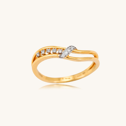 Embrace the elegance of our Sway Diamond 18kt Gold Ring, a sophisticated accessory that adds a touch of timeless beauty to any outfit. Whether you're seeking a thoughtful gift for her or a versatile ring to complement your casual and work-wear ensembles, this piece is perfect. Priced under 30,000, it effortlessly transitions from the office to weekend getaways