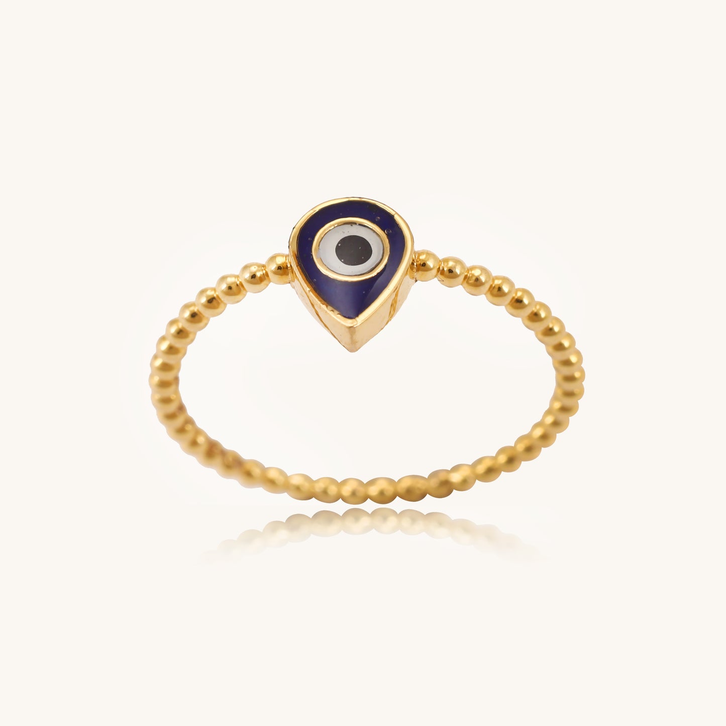 Elevate your style and protect yourself with our stunning 18 kt gold Evil Eye Ring, crafted with Natural Diamonds. This sleek design adds a touch of elegance to your everyday wear, work, or casual looks while warding off negativity. An ideal gift for her.