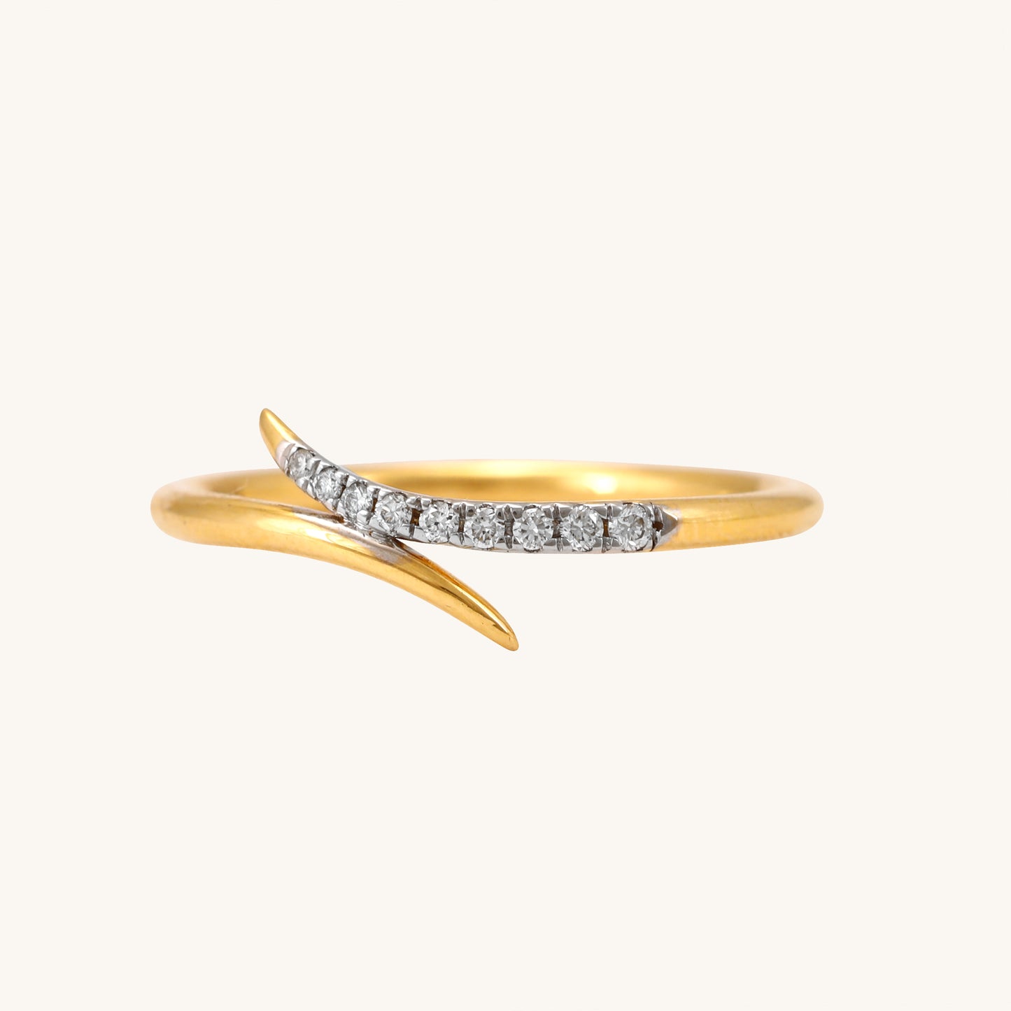 Dive into elegance with our 18 kt Teensy Wave Ring, a stunning addition from our spring edit collection, all priced affordably under Rs. 30,000. This exquisite jewellery piece effortlessly transitions from day to night, ensuring versatility for any ensemble. Ideal for gifting, it adds a touch of sophistication to her collection.