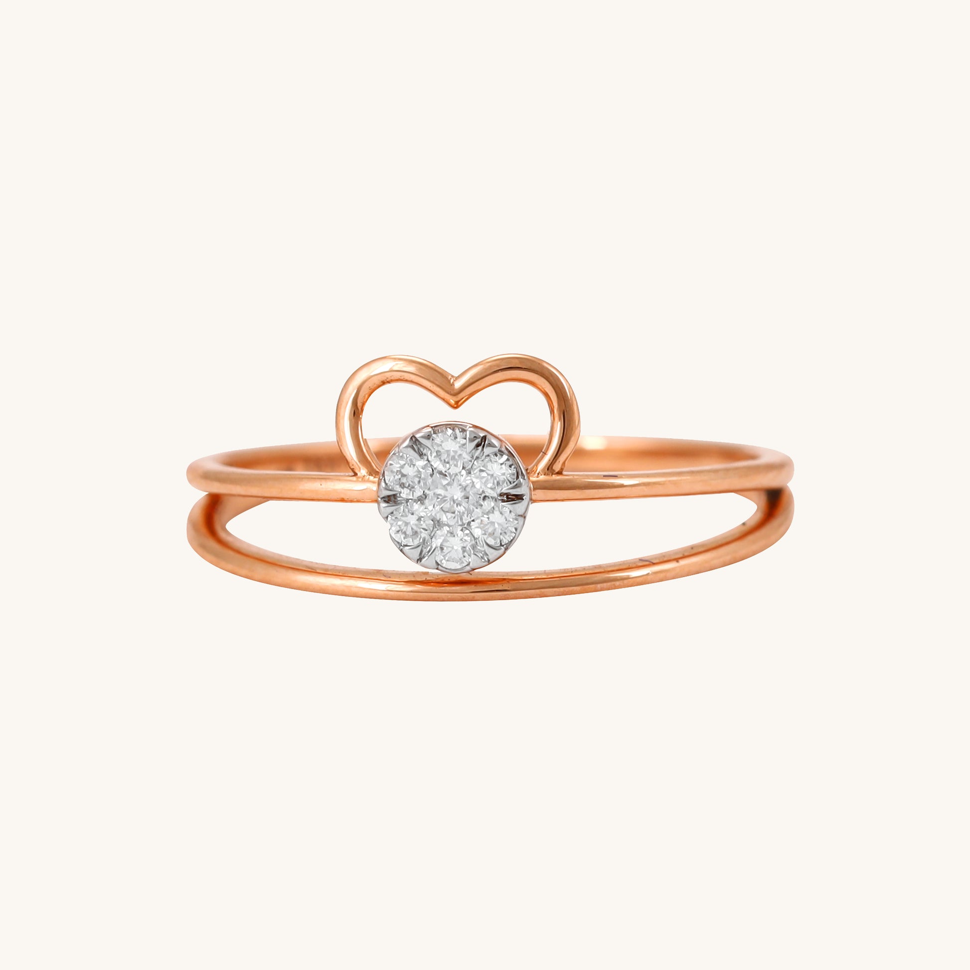 Elevate your everyday style with the Radiant Heart Ring, a stunning 18kt gold piece featuring a captivating heart-shaped diamond center. This versatile ring seamlessly transitions from work to weekend, adding elegance to any ensemble. Perfect for gifting or personal wear, it's a thoughtful addition to your jewellery collection under 30,000