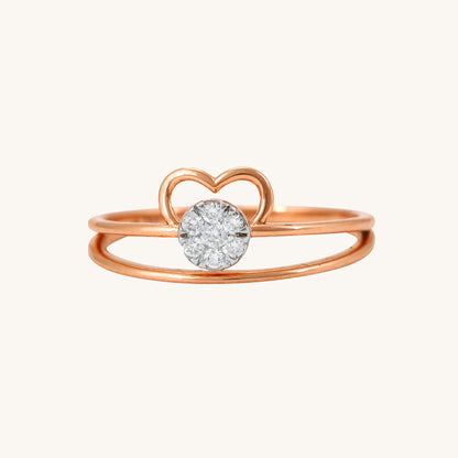 Elevate your everyday style with the Radiant Heart Ring, a stunning 18kt gold piece featuring a captivating heart-shaped diamond center. This versatile ring seamlessly transitions from work to weekend, adding elegance to any ensemble. Perfect for gifting or personal wear, it's a thoughtful addition to your jewellery collection under 30,000