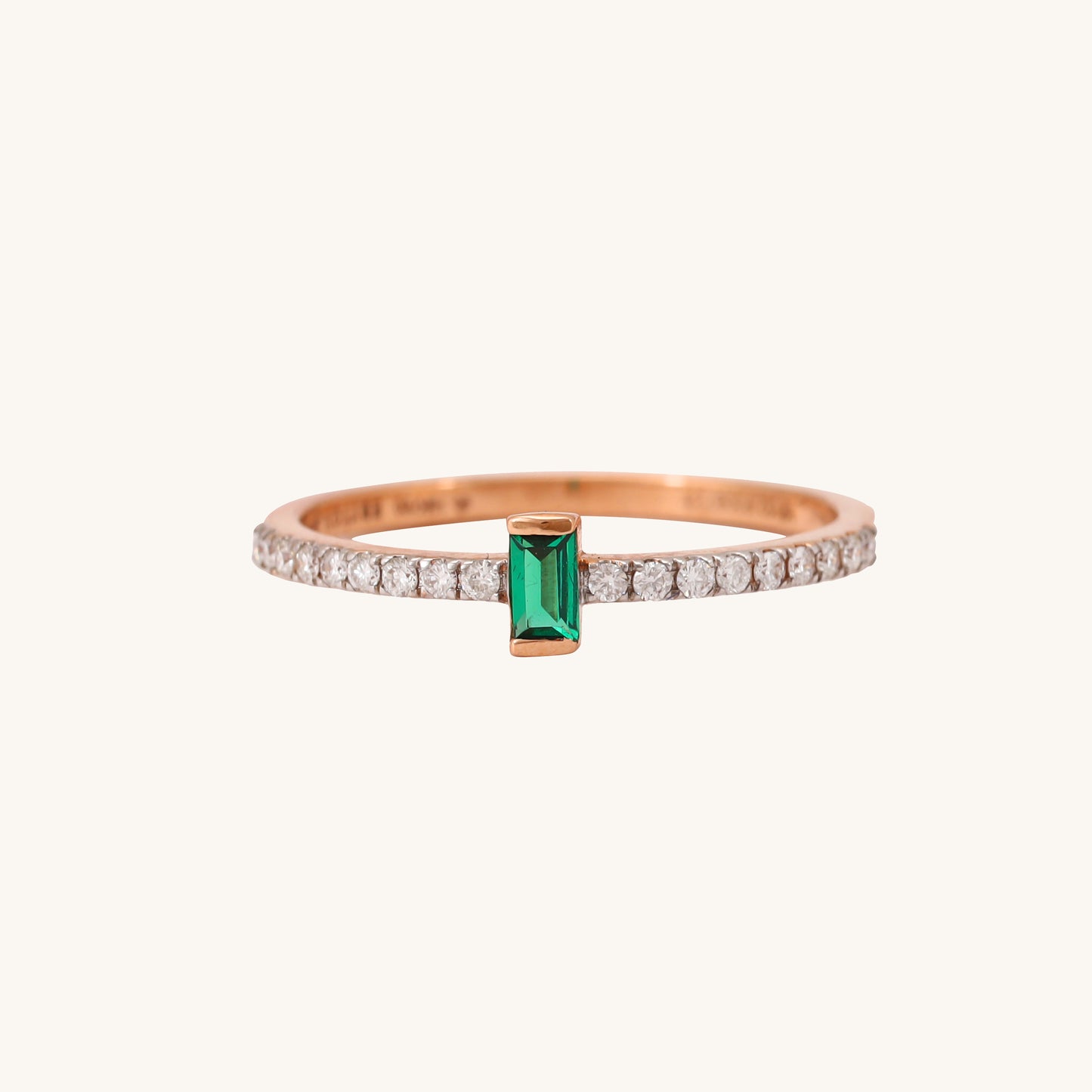 Elevate your style with our stunning 18 kt gold ring featuring a captivating emerald. Crafted for everyday wear, it seamlessly transitions from casual to formal occasions, making it the perfect accessory for women. Explore our under 30,000 collection for exquisite gifting ideas, ideal for any occasion.