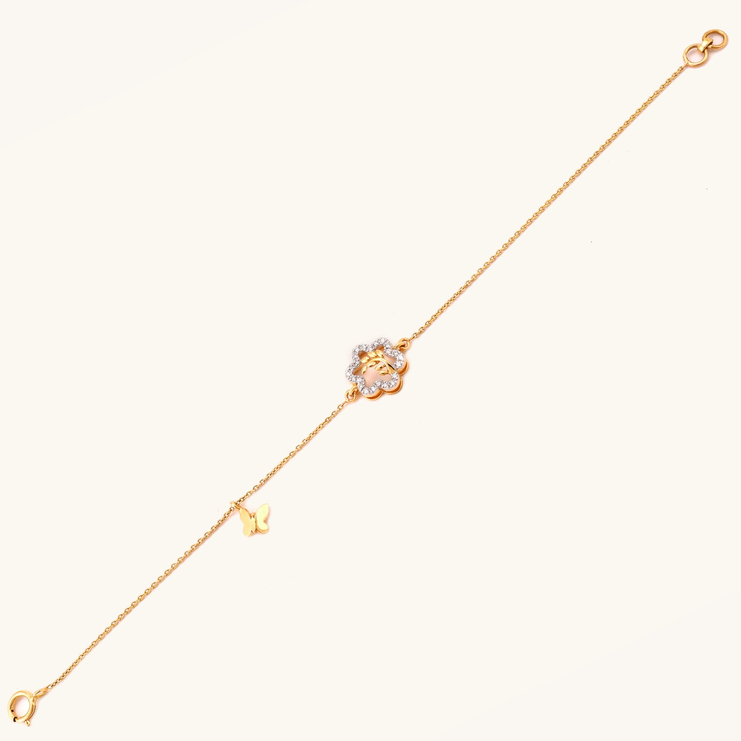 Bloom Butterfly Bracelet in 18kt gold and diamond. Shop trendy gold and diamond jewellery online under Rs 20,000. Latest 2024 collection of minimal designs. Best prices in India for stylish 18kt gold pieces. Gold and diamond jewellery online, Latest collection, Best prices in India, Trendy jewellery, Minimal designs, Gifts in gold.