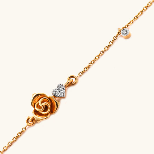 Elevate your everyday style with this exquisite 18Kt gold bracelet featuring a delicate heart design. Crafted with exceptional attention to detail, this timeless piece effortlessly adds a touch of charm and elegance to any outfit. Whether pairing it with casual or formal attire, this versatile bracelet is the perfect accessory to elevate your look. Priced affordably under Rs. 30,000, this bracelet makes for a thoughtful and valuable gift for your loved ones.