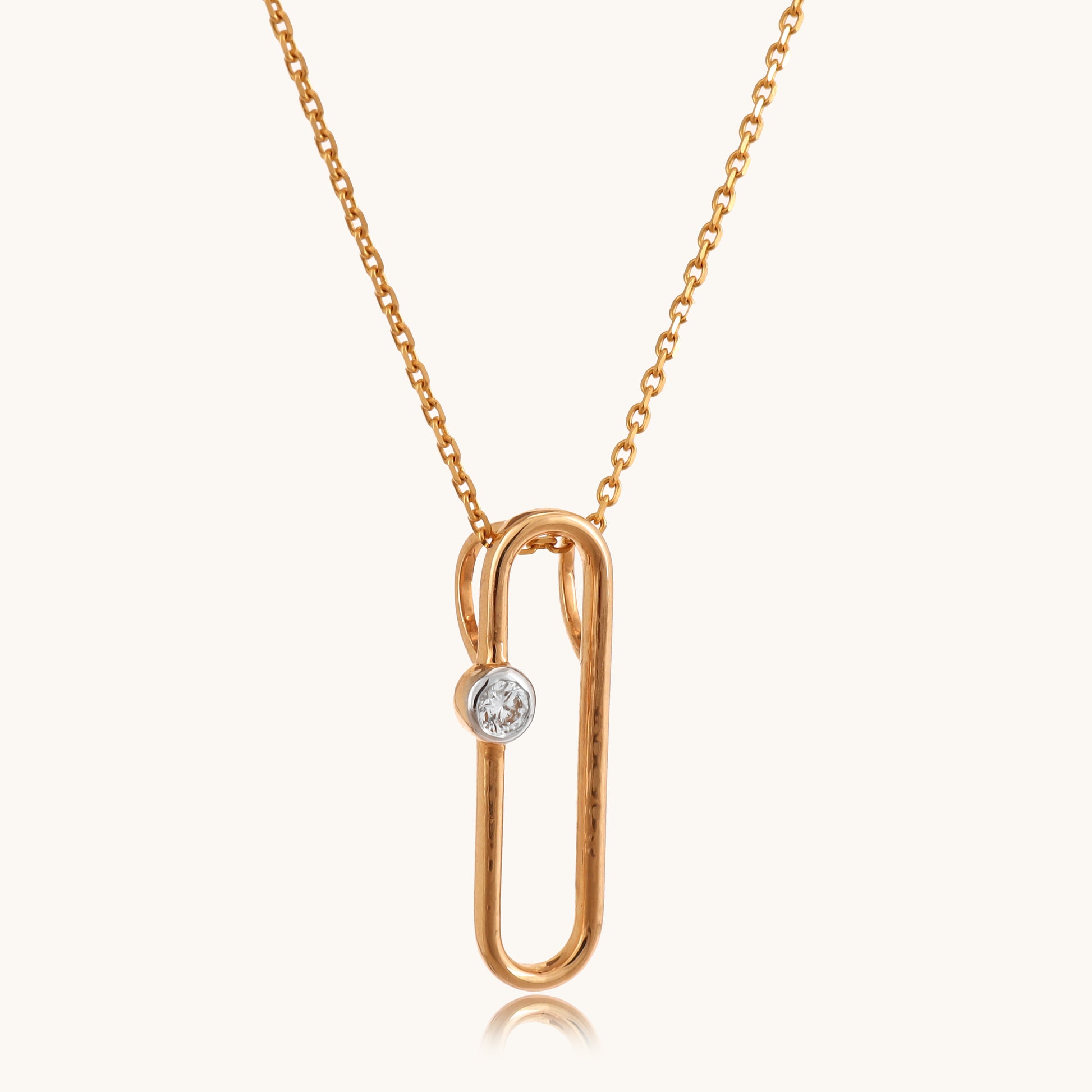 Illuminate your everyday attire with our elegant Pin diamond pendant, expertly crafted in 18kt gold and priced under 30,000. Versatile and chic, this delicate piece effortlessly enhances your workwear ensemble, adds a touch of refinement to your casual look, or infuses your everyday wear with subtle sparkle.