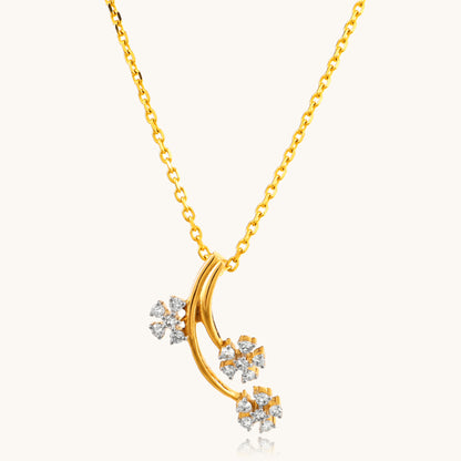 Indulge in elegance with our captivating 18kt gold Lily Diamond Pendant. This enchanting design blooms with a sparkling diamond, perfect for infusing everyday wear with a touch of femininity. Priced under 30,000, it's an ideal gift for her or a delightful treat for yourself.