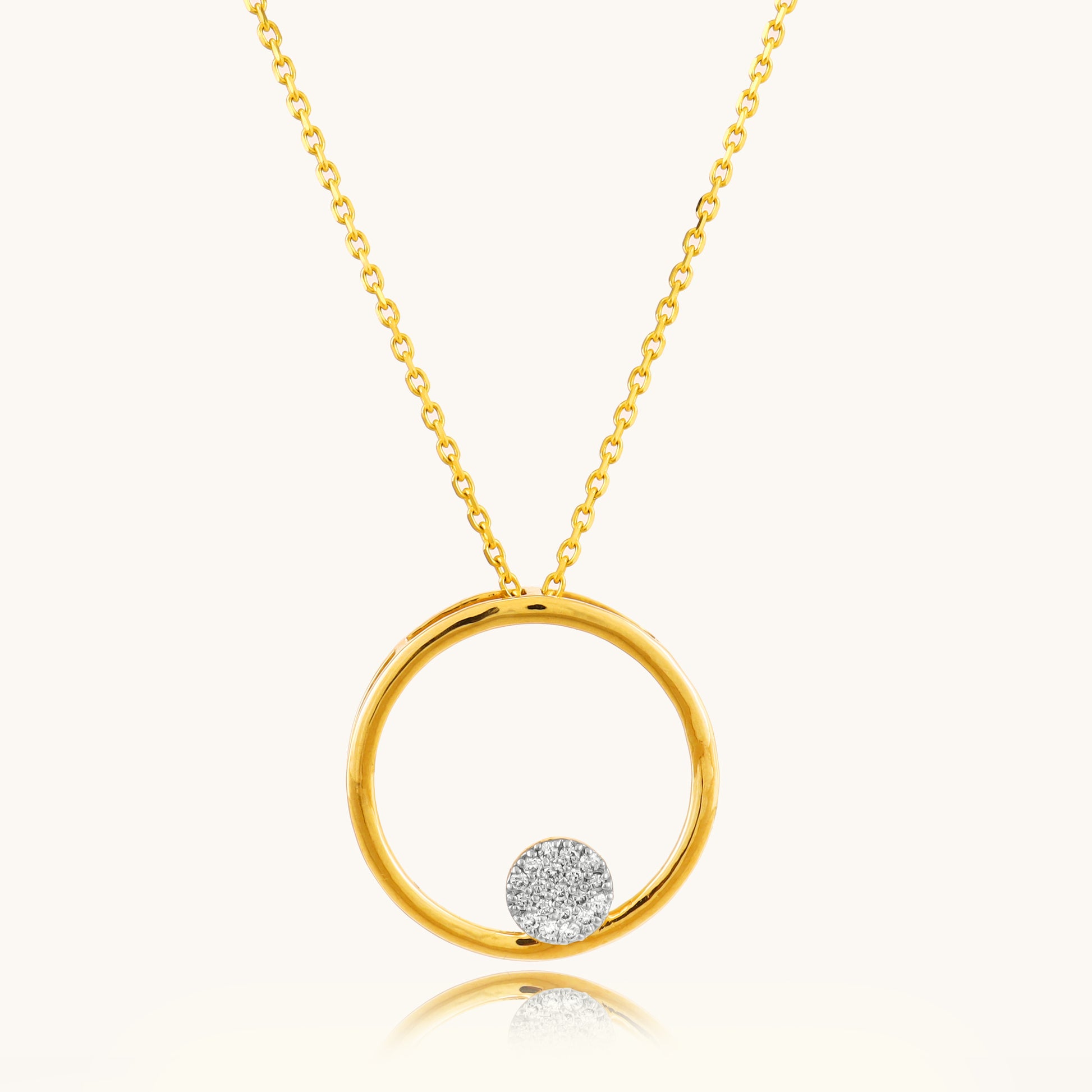 Elevate your everyday style with our exquisite 18kt gold Circle Diamond Pendant. Featuring a sparkling diamond, this timeless design is perfect for everyday wear, effortlessly adding elegance to your casual, work, or formal attire. Ideal as a gift for her under 30,000.