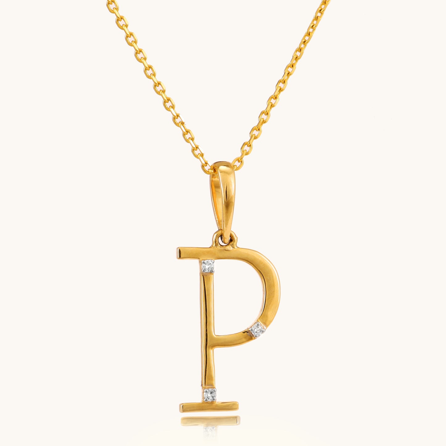 Enhance your everyday style with our delicate 18 kt gold P Diamond Pendant, adding a personal touch to your ensemble. Perfect for elevating your workwear edit, casual look, or everyday outfit, this pendant shines effortlessly. Explore our Under 30,000 collection now to find your perfect piece.