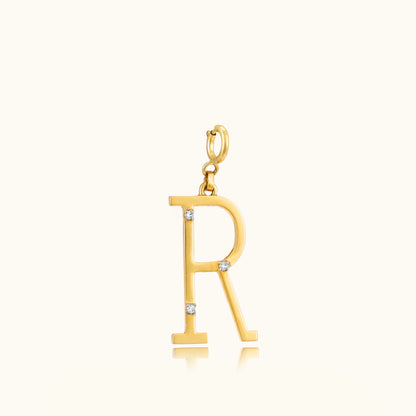 18kt gold Letter R Pendant with IGI-certified VVS diamonds, BIS hallmarking, and a lightweight design, perfect as personalized jewelry or everyday wear. From Caratly Jewelry under Rs. 15,000.