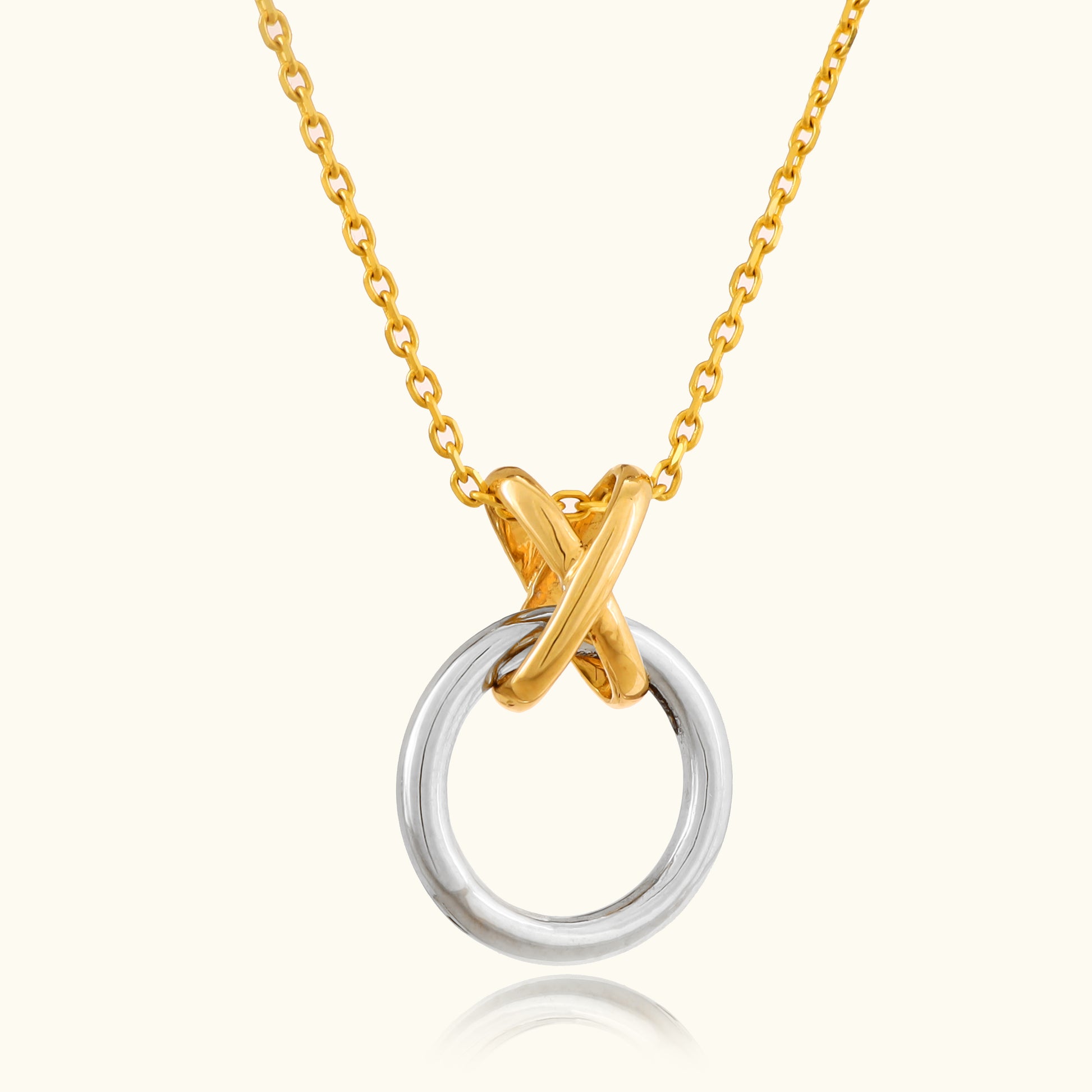 Upgrade your style effortlessly with our striking 18kt Gold Loop Pendant, blending modern sophistication with timeless elegance. Perfect for the minimalist, this pendant adds contemporary flair to any ensemble, whether it's your everyday look, workwear, or evening attire