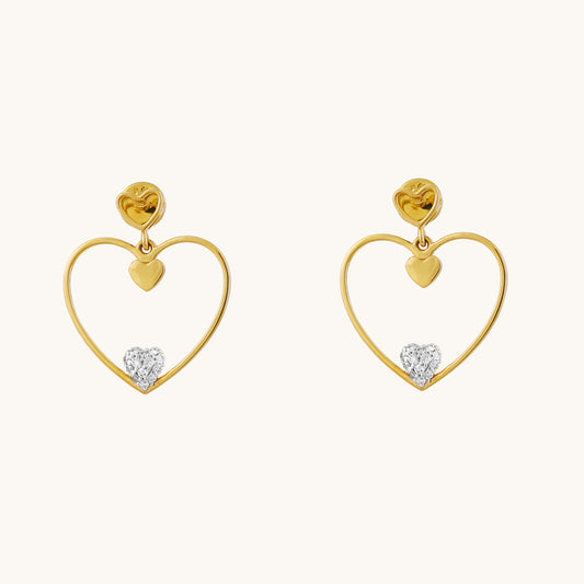 Discover chic sophistication with our Spring Edit, featuring the elegant 18 kt Double Heart Earring, priced under Rs. 50,000. These versatile jewellery pieces effortlessly transition from day to night, making them a perfect addition to any ensemble. Ideal for gifting to her, shop now to add timeless elegance to her collection.