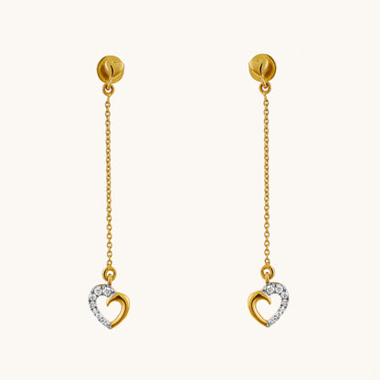 Express your love with the Dropping Heart Earrings. These delicate 18kt gold earrings feature sparkling diamonds and a charming heart design, perfect for everyday wear or adding a touch of romance to work or casual attire. A thoughtful gift idea for her at an affordable price range from our Under 30,000 collection.