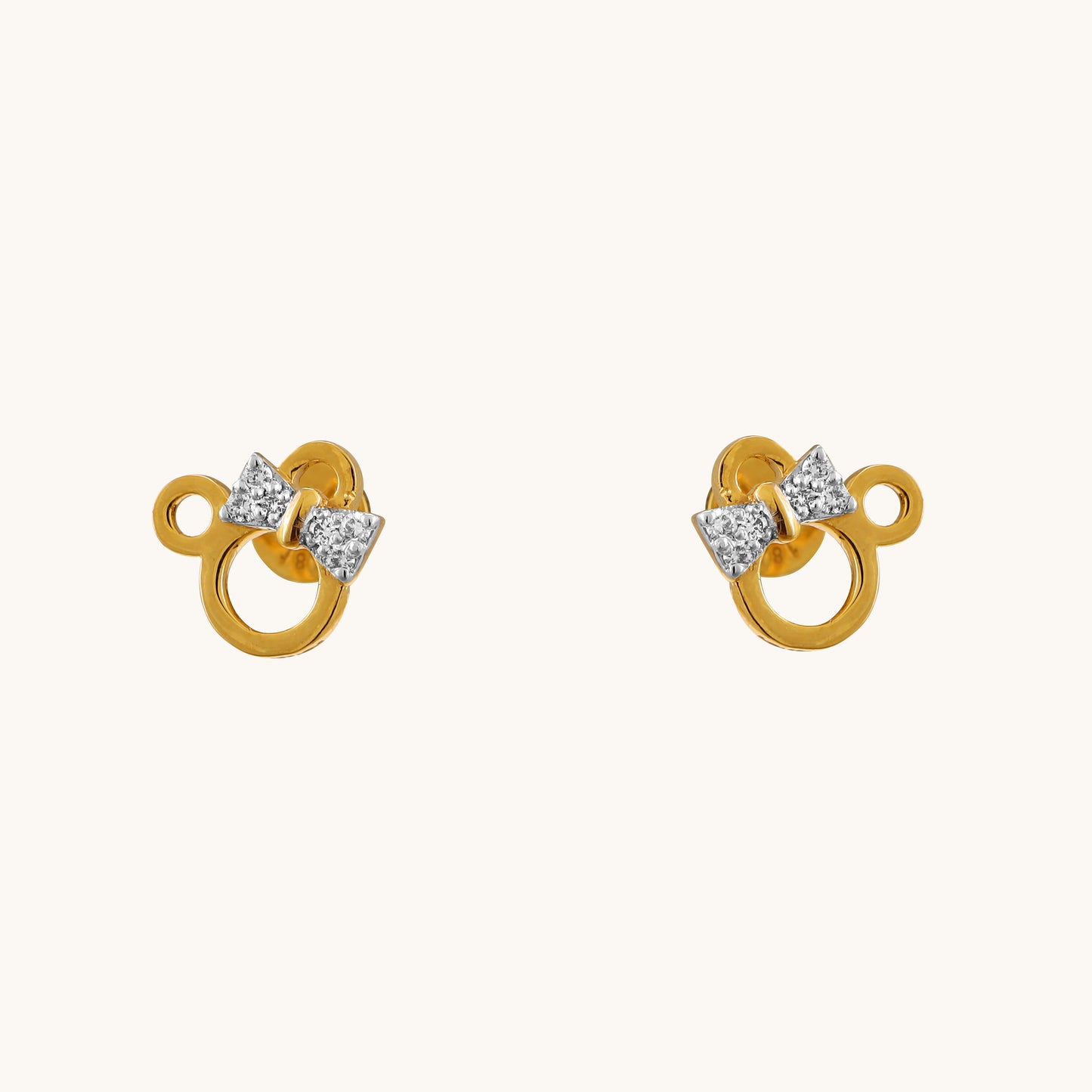 Introducing our Spring Edit: the charming 18 kt Mickey Diamond Earring, priced under Rs. 30,000. These chic jewelry pieces transition seamlessly from day to night, making them a perfect addition to any ensemble. Ideal for gifting to your kids, shop now to add a touch of whimsical elegance to their collection.