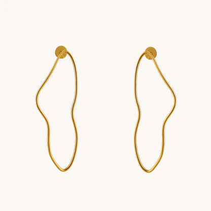 Elevate your everyday elegance with our Swirl Gold Earrings, meticulously crafted in 18kt gold, seamlessly complementing any casual or workwear ensemble with a touch of luxury. Ideal for gifting, explore our Under 30,000 collection for affordable yet exquisite pieces that add sophistication to every look. 