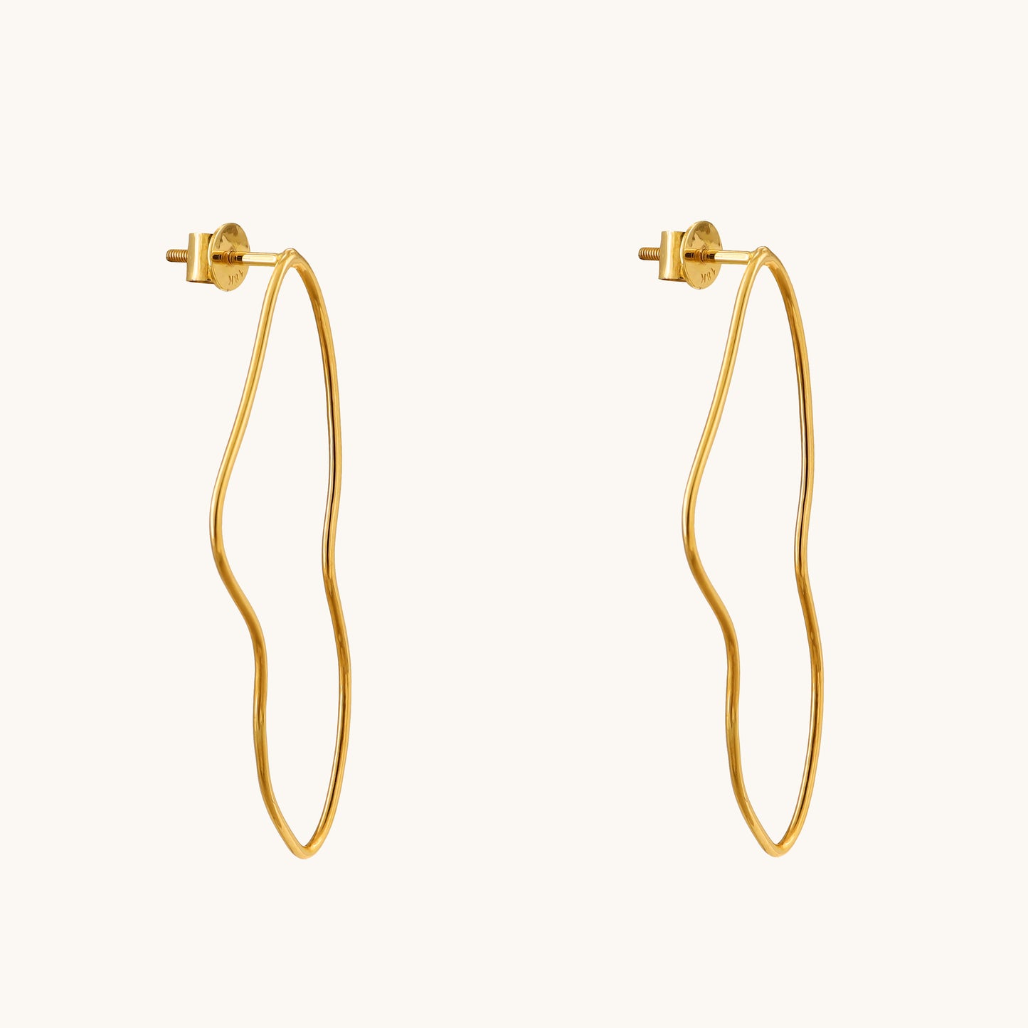 Elevate your everyday elegance with our Swirl Gold Earrings, meticulously crafted in 18kt gold, seamlessly complementing any casual or workwear ensemble with a touch of luxury. Ideal for gifting, explore our Under 30,000 collection for affordable yet exquisite pieces that add sophistication to every look. 