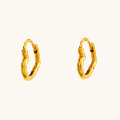 Express your love in style with the Gold Heart Hoop Earrings crafted in 18kt gold under Rs. 30,000. These earrings are a perfect way to add a touch of everyday romance to your look. Versatile enough for casual wear, work attire, or a special occasion, they make a thoughtful and delightful gift idea for her.