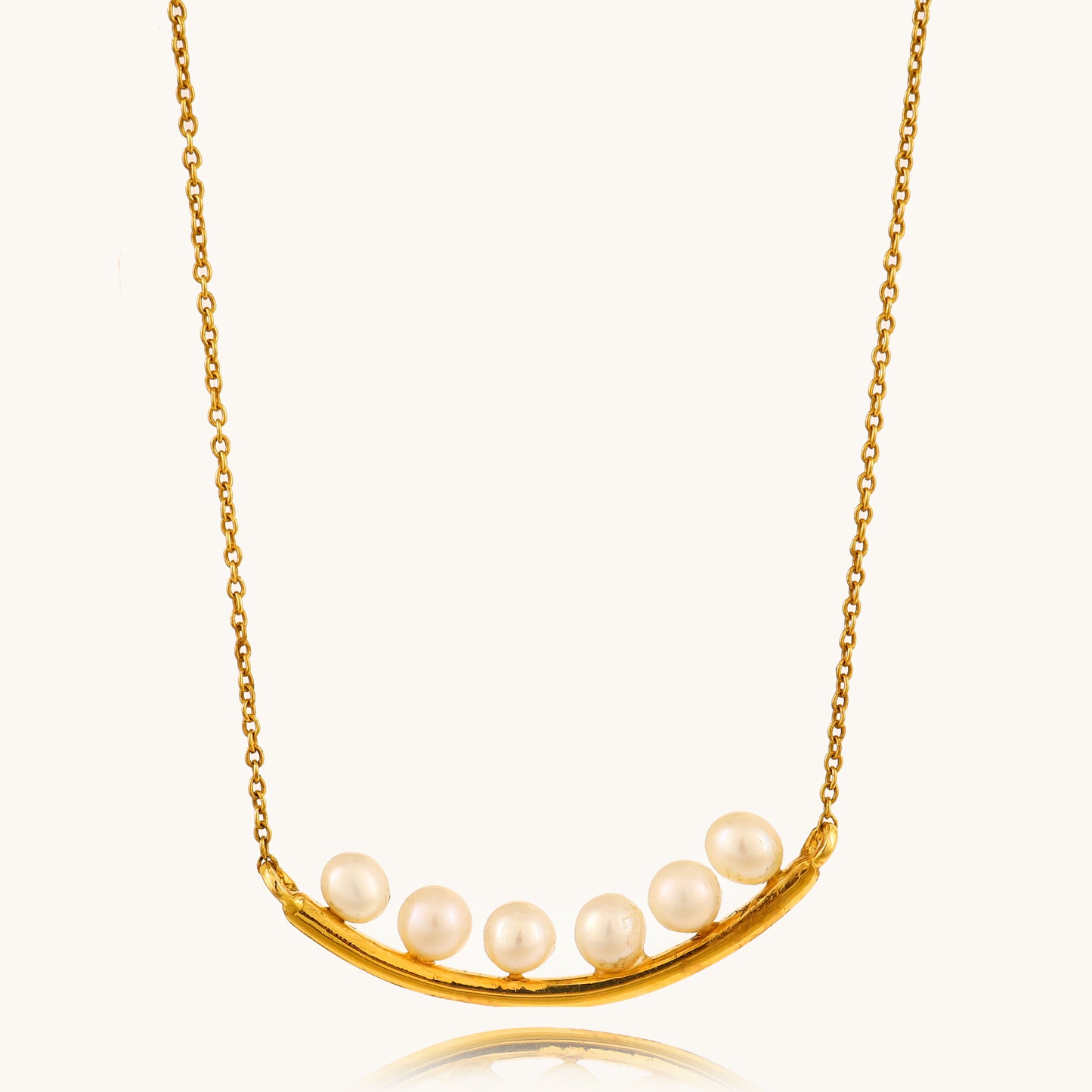 Explore elegance with our Spring Edit: the exquisite 18 kt Pearl Bar Necklace, a must-have jewellery piece for seamless day-to-night style. Priced under Rs. 30,000, it's the perfect accessory to elevate any ensemble with timeless sophistication. Ideal for gifting to her, shop now and discover the enduring beauty of fine jewellery.