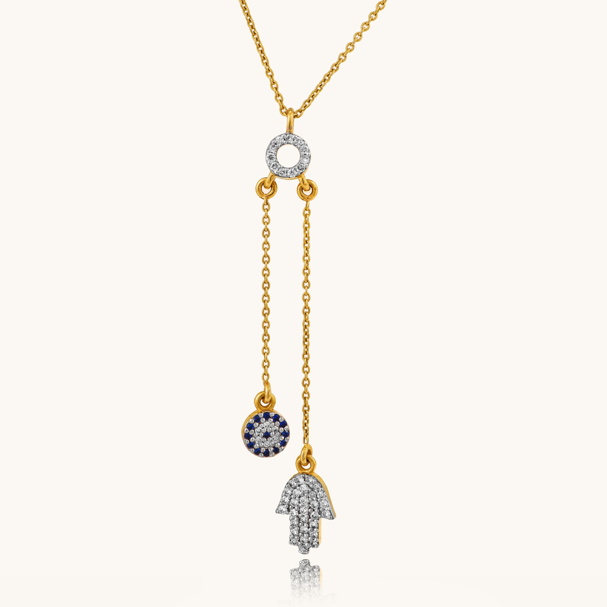 Embrace positivity with the captivating 18 kt Gold Evil Eye Hamsa Necklace for Women. This elegant necklace serves as a versatile accessory for everyday wear, bringing good fortune and protection. Part of our Under 50,000 collection, it makes a thoughtful gift idea for her, effortlessly complementing both casual and work attire for a chic, modern look. Crafted with precision and style, the Hamsa design adds a touch of sophistication to any outfit, symbolizing blessings and warding off negativity. 