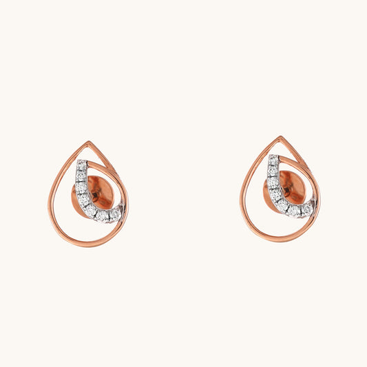 Curvy Diamond Earrings in 18kt gold with IGI-certified VVS diamonds; perfect for everyday wear or gifting under Rs. 20K.