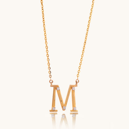 Close-up of the Diamond Alphabet M Necklace by Caratly, featuring 18kt gold and IGI-certified diamonds. A perfect blend of elegance and affordability, ideal for everyday wear or gifting under Rs. 30K.