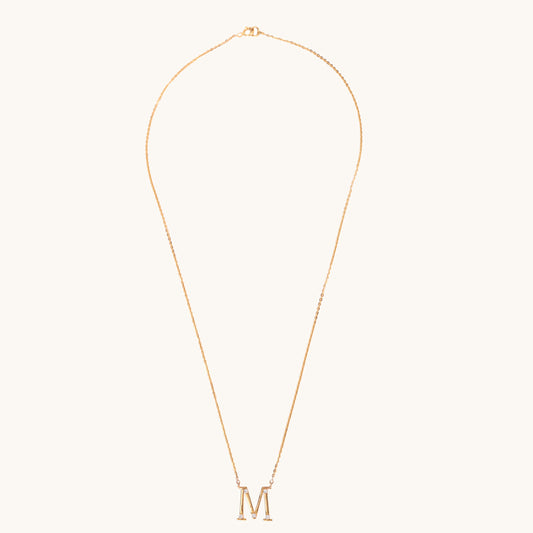 Diamond Alphabet M Necklace by Caratly, featuring 18kt gold and IGI-certified diamonds. A perfect blend of elegance and affordability, ideal for everyday wear or gifting under Rs. 30K.