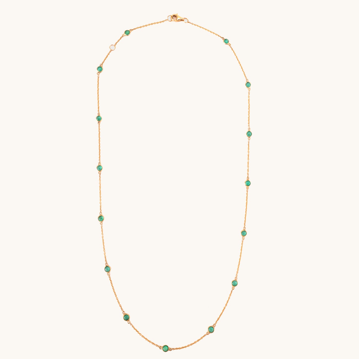 18kt gold emerald necklace. Fine jewellery under ₹50,000. Chic, timeless, luxe.