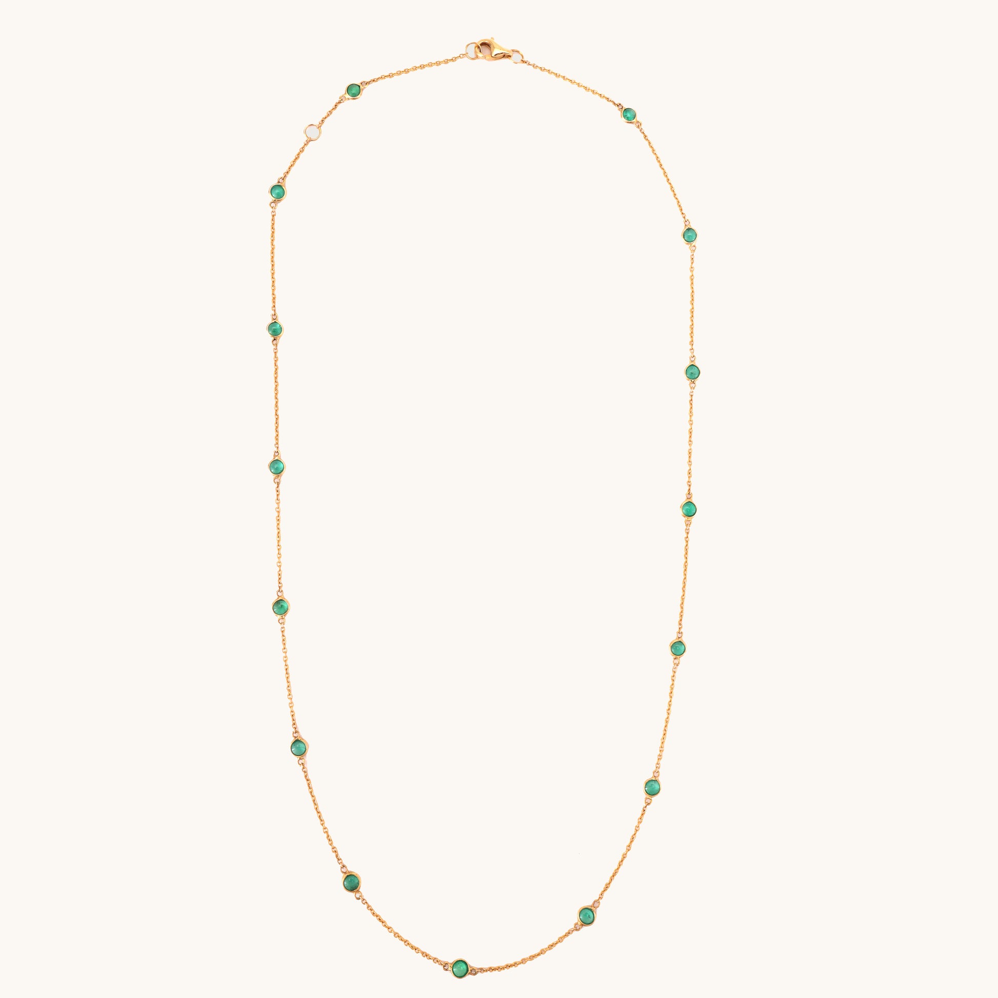 18kt gold emerald necklace. Fine jewellery under ₹50,000. Chic, timeless, luxe.