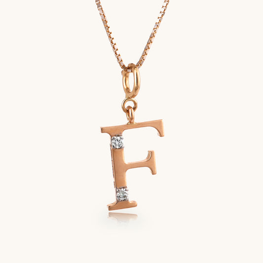 18kt gold "F" initial pendant with VVS diamonds—affordable luxury fine jewellery for women.