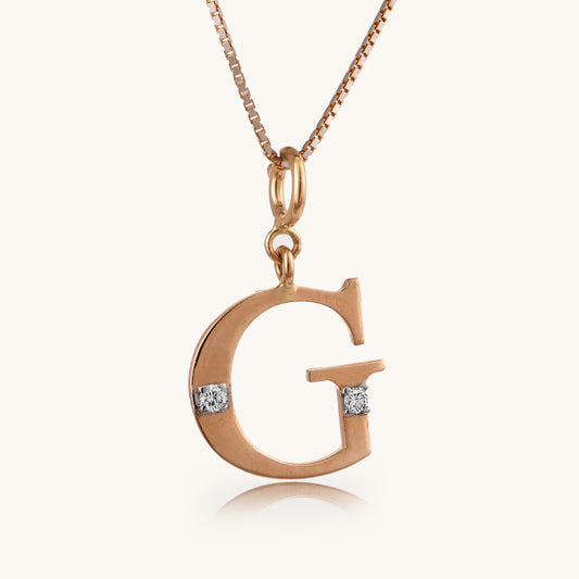 18kt gold "G" initial pendant with VVS diamonds—affordable luxury fine jewellery for her.
