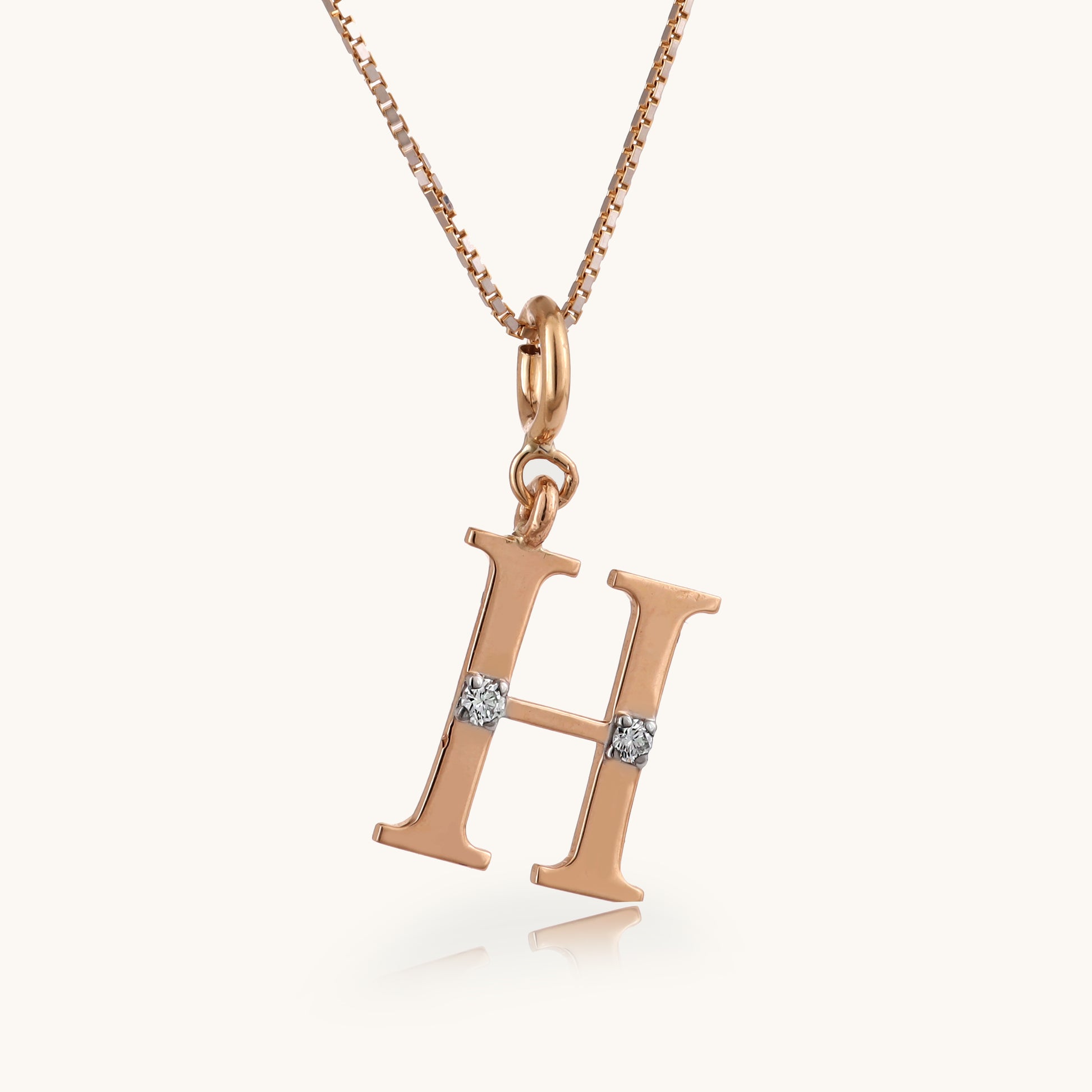 18kt gold "H" initial pendant with VVS diamonds—luxury fine jewellery under ₹15,000 for her.