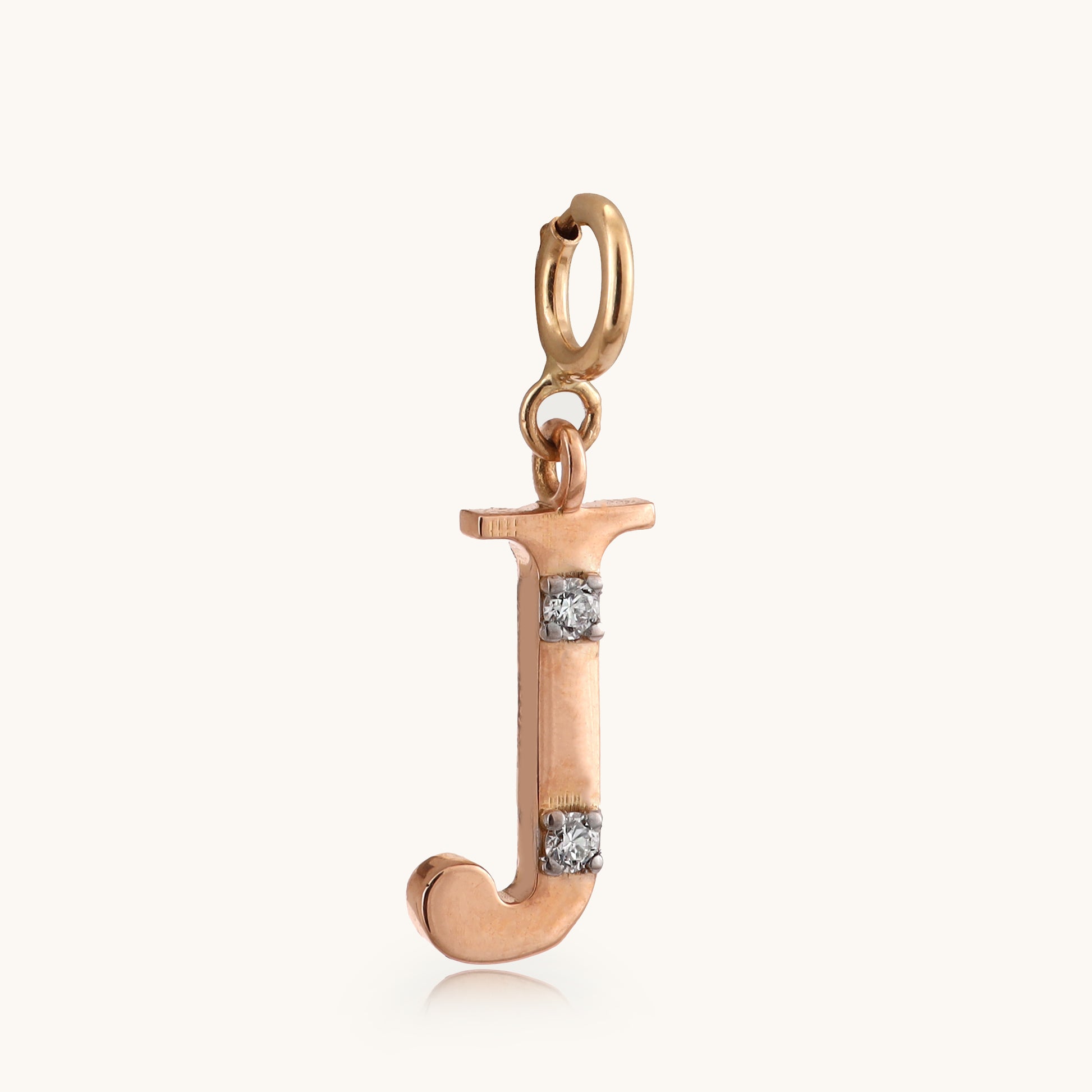 18kt gold "J" initial pendant with natural VVS diamonds – stylish, affordable fine jewellery.
