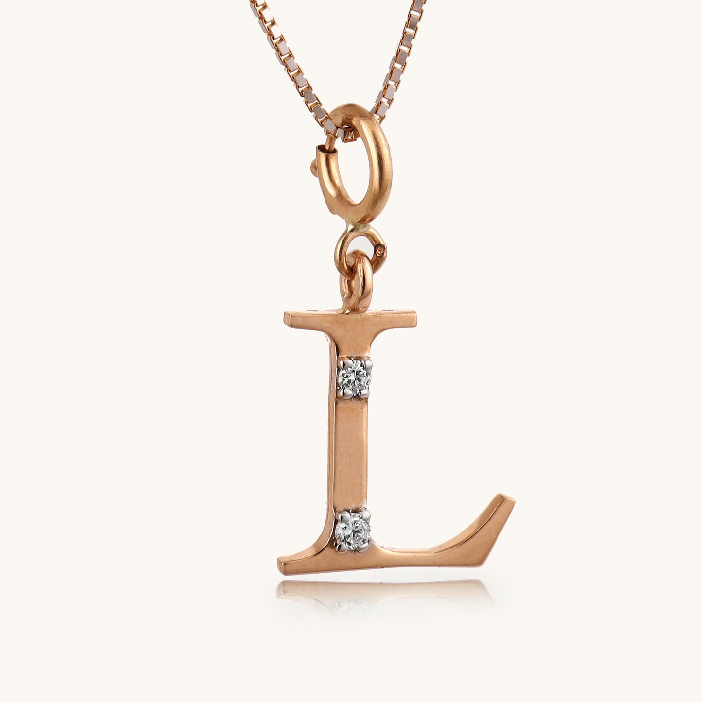 18kt gold "L" initial pendant with natural diamonds—luxury fine jewellery under ₹15,000.
