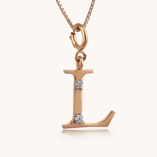 18kt gold "L" initial pendant with natural diamonds—luxury fine jewellery under ₹15,000.