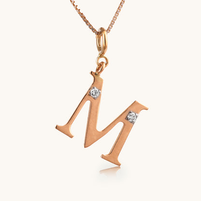 18kt gold "M" initial pendant with natural diamonds—luxury fine jewellery under ₹15,000.