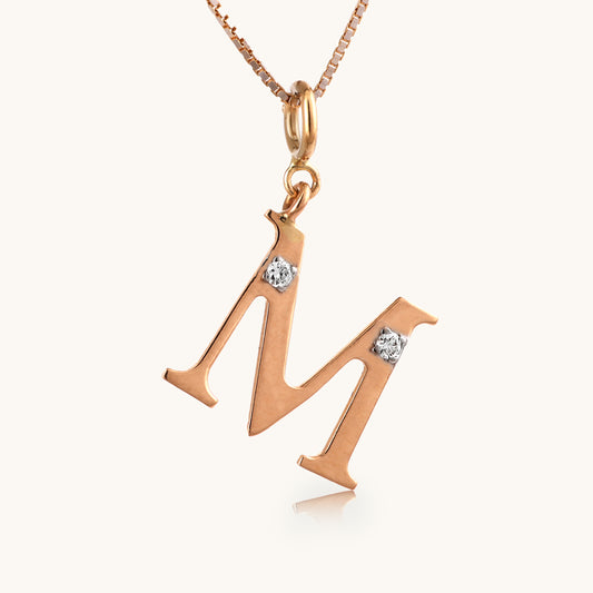 18kt gold "M" initial pendant with natural diamonds—luxury fine jewellery under ₹15,000.