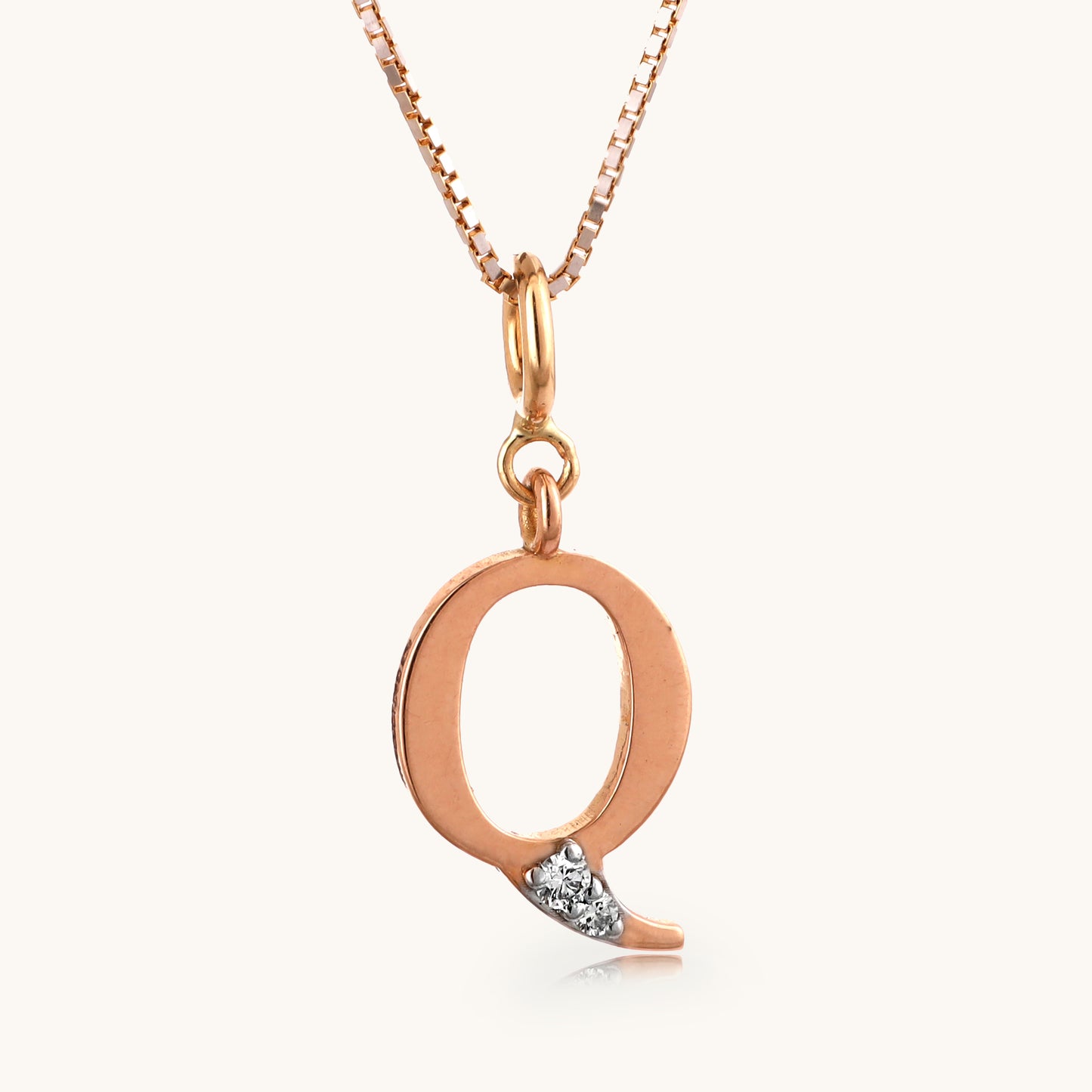 18kt gold "Q" initial pendant with natural diamonds—personalized fine jewellery under ₹15,000.