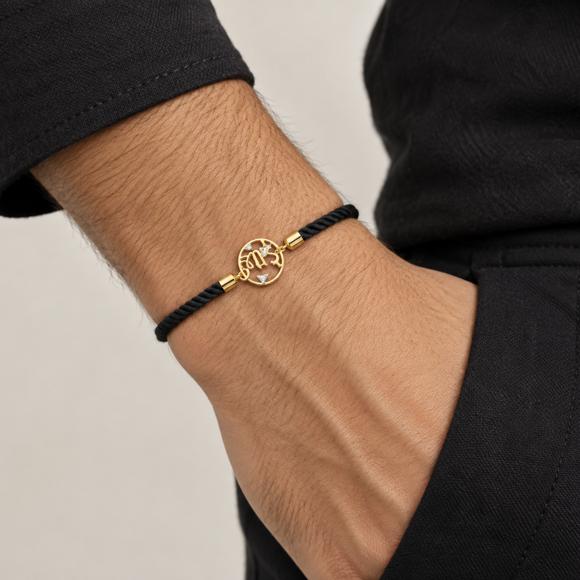 Black rope men's diamond bracelet with an 18kt gold circular 'Bhai' medallion and diamond accents. A minimal gift for him Under Rs. 20,000