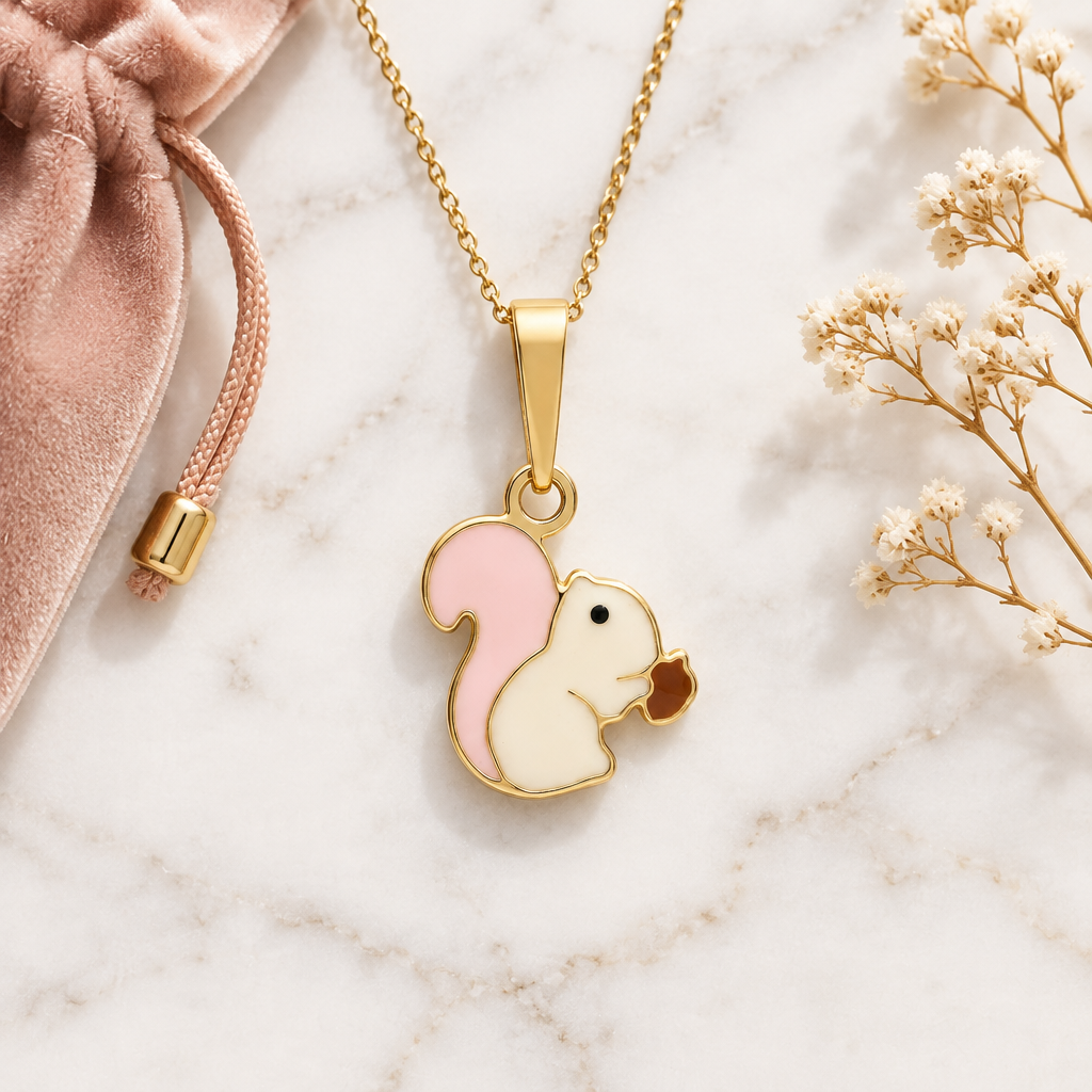 Gold chipmunk pendant with pink and white enamel detailing. Cute gifts under Rs. 20,000